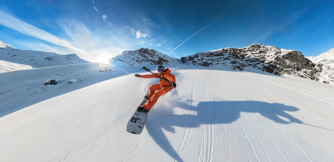 Creator snowboarding with an Insta360 360 camera