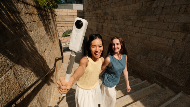 two women filming a travel vlog with insta360 x5 camera