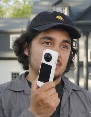MrBeast's director of photography Rafael Lopez holding Insta360 X5 Arctic White Edition.